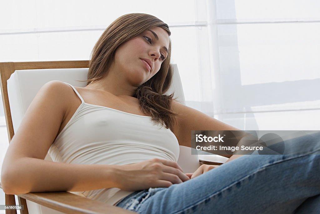 Young woman looking wistful  Adult Stock Photo