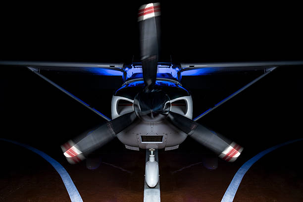 little sketchy man flying in a blue plane with banner