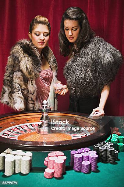 Women At Roulette Wheel Stock Photo - Download Image Now - Abundance, Adults Only, Casino