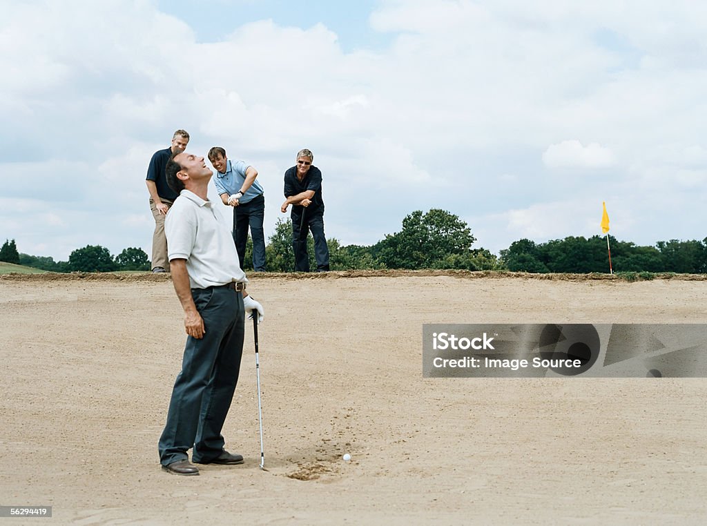 Golfers laughing - Стоковые фото Игрок в гольф роялти-фри