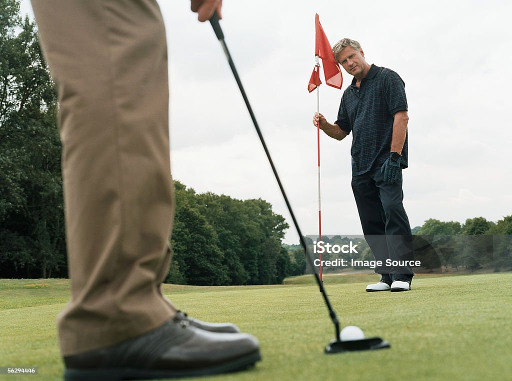 Mężczyźni Gra w golfa - Zbiór zdjęć royalty-free (Dwie osoby)