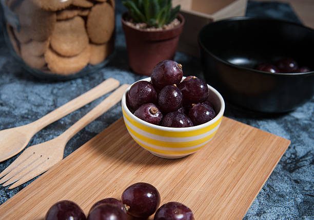 istock Fresh grape fruits on marble table. Flat lay. 564559242