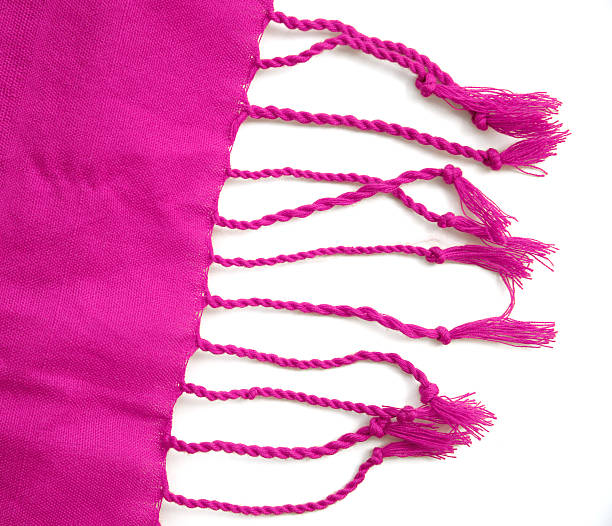 istock Pink fabric background with rope on white. 564562944