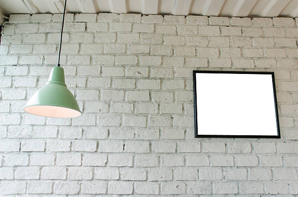 istock picture frame in room with ceiling lamp 564563620