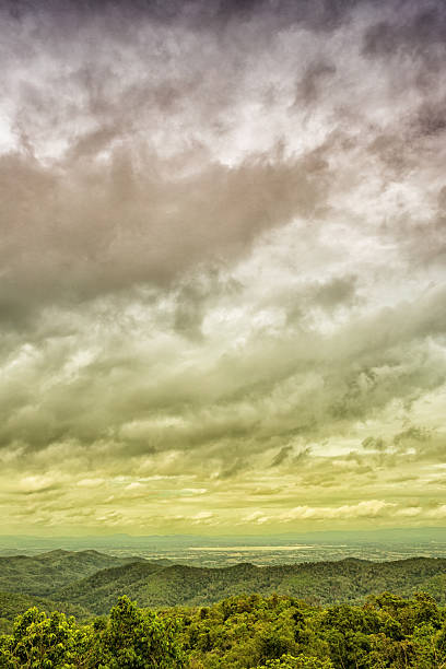 istock The view from atop a mountain with rainy cloud 564564750