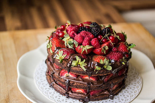 istock Strawberry cake with blackberry, mulberry and dark chocolate 564565376