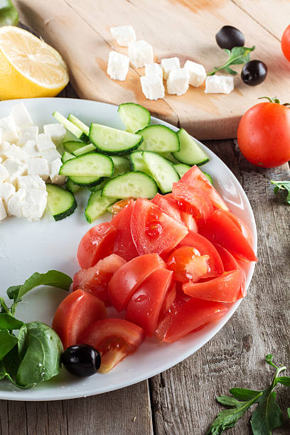 istock Cooking Greek salad 564566246