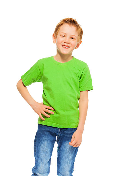 istock Happy smiling boy in green t-shirt and denim 564567390