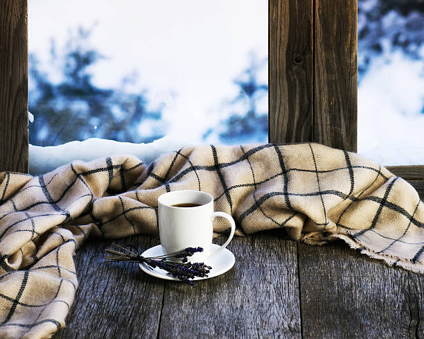 istock White cup of coffee or tea, lavender flowers 564567670