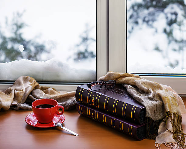 istock Red cup of coffee or tea with a metal spoon 564569698