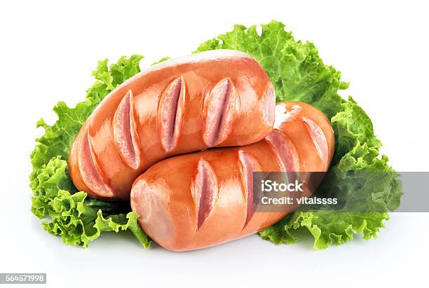 Fried Sausages With Lettuce Isolated On White Background Stock Photo - Download Image Now