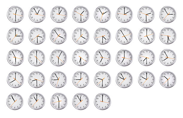 clocks shows the time from an hour to twelve - minute hand number 10 clock hand number 11 imagens e fotografias de stock