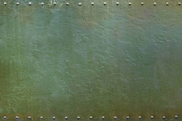 military riveted metal plate 1 Riveted military or industrial plate. Metal background. rivet texture stock pictures, royalty-free photos & images