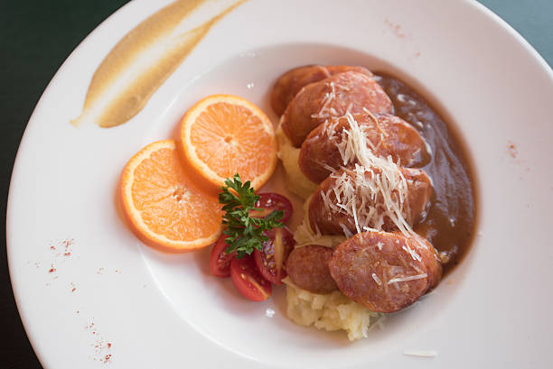 Sausages and mashed potato and gravy.