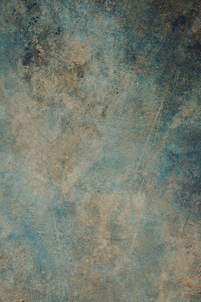 istock Closeup of rough textured background in blue 564575080