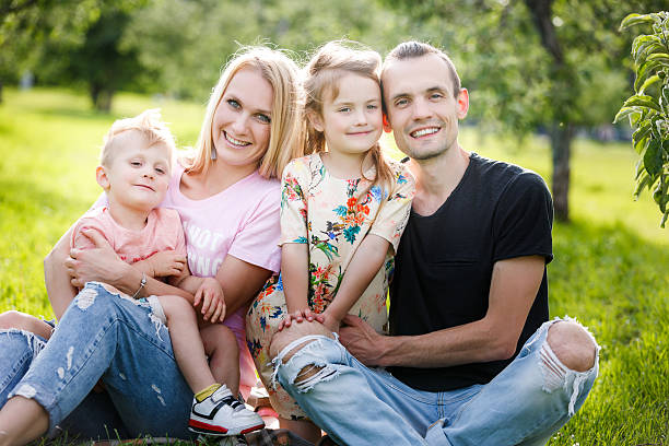 istock Family playing in the park 564578618