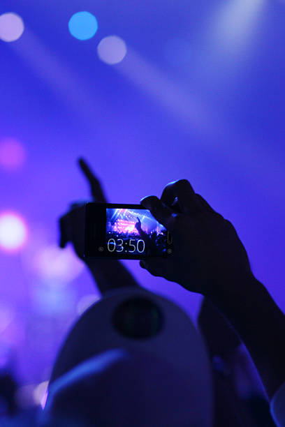 istock Filming with smartphone 564579412