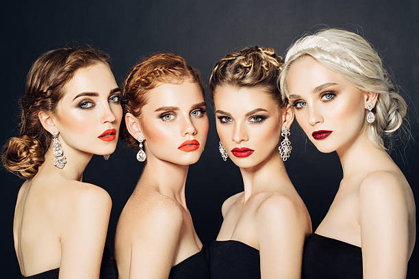 istock Four beautiful girls with make-up 564586780