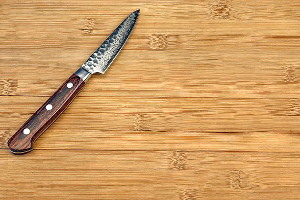 istock Japanese Professonal Kitchen Knife On The Bamboo Cutting Board 564588304