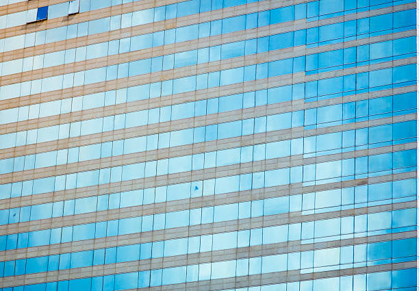 istock windows of business building 564588686