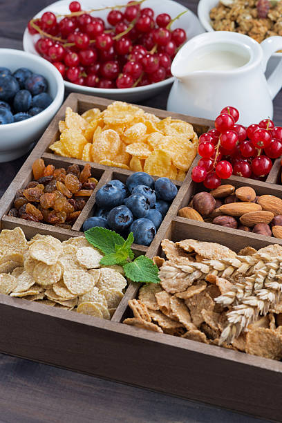 istock breakfast cereal and other fresh ingredients in a wooden box 564589054