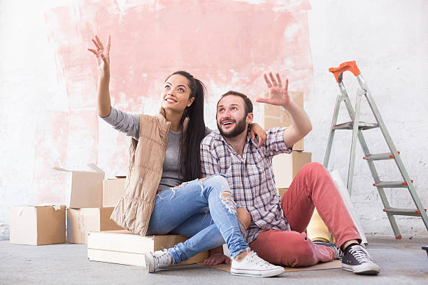 istock Young couple making plans for home improvement 564589908