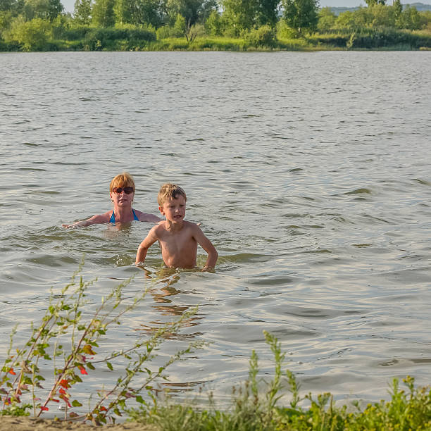 istock Family fun on the river in summer 564590234