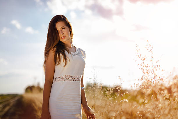 istock Beautiful woman in fields 564590774