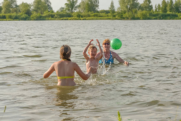 istock Family fun on the river in summer 564591362