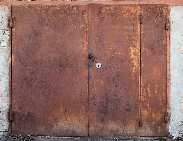 istock old metal warehouse door 564591634
