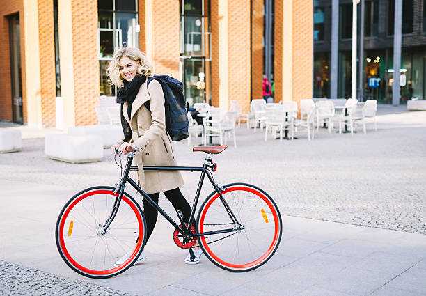 istock Happy Girl Cycling To Work 564591916