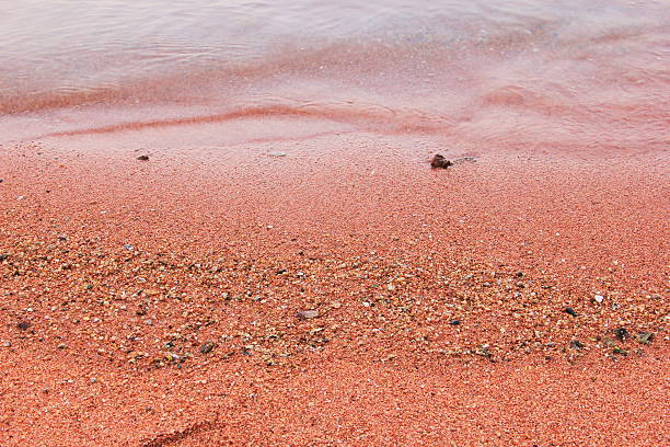 red sand beach in the evening sea background