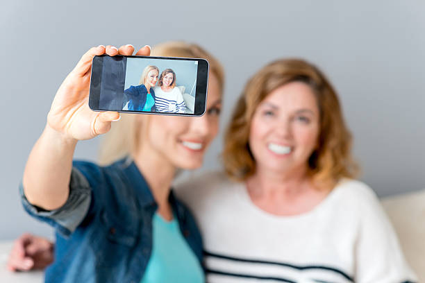 istock Joyful family making selfie at home 564592962
