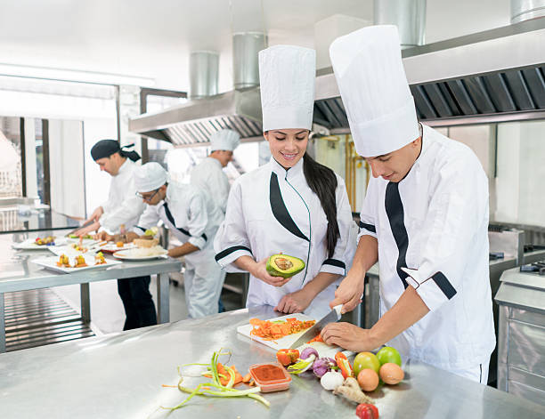 istock Chefs cooking at a commercial kitchen 564594448