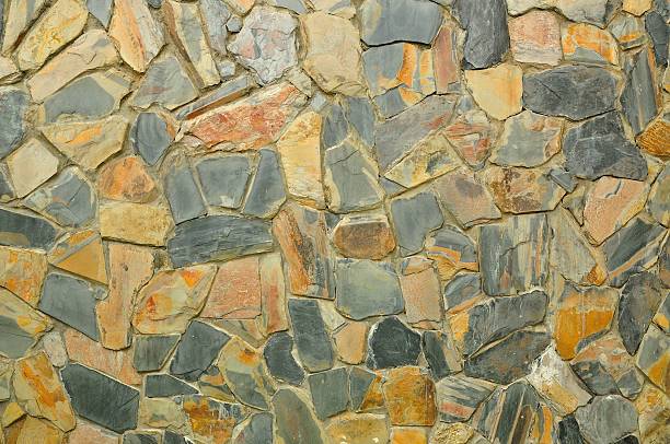 istock Background of stone wall texture photo 564595764
