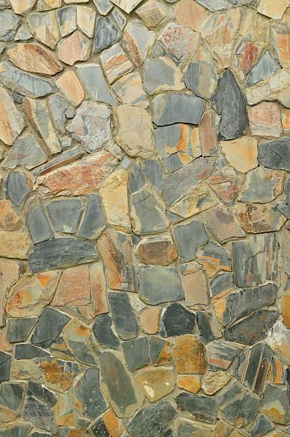istock Background of stone wall texture photo 564595836