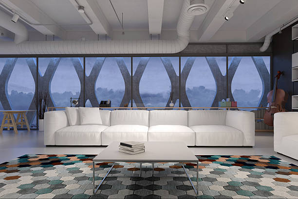 istock Living room with sofa and window behind 564596374