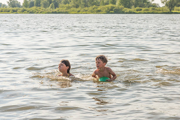 istock Family fun on the river in summer 564600216