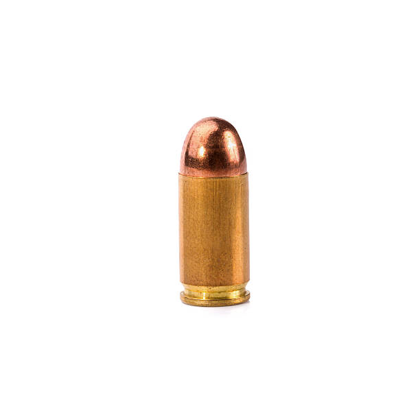 istock 9mm bullet for a gun isolated on white background 564600438