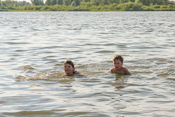 istock Family fun on the river in summer 564600470