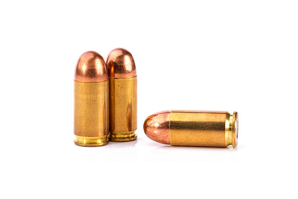 istock 9mm bullet for a gun isolated on white background 564600480