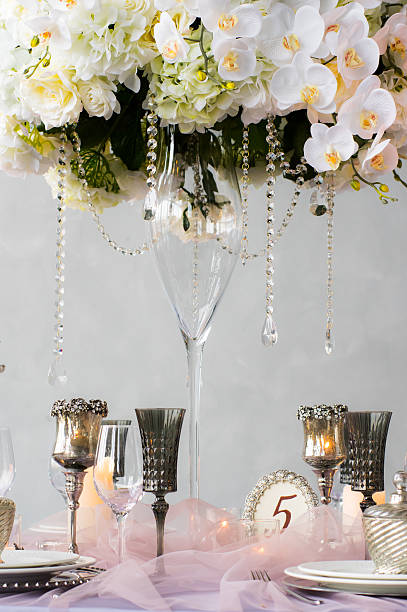istock Wedding decoration with orchids and candles 564600888