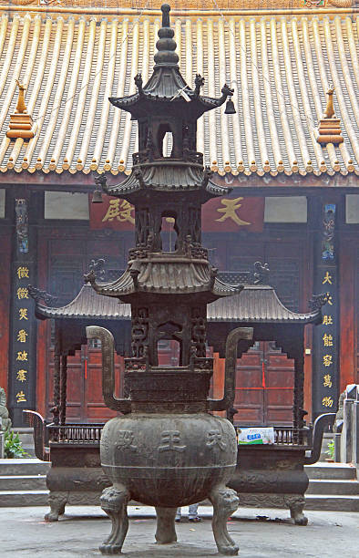 sculpture of multistory pagoda in park, chengdu - iron asian culture buddhism buddha imagens e fotografias de stock
