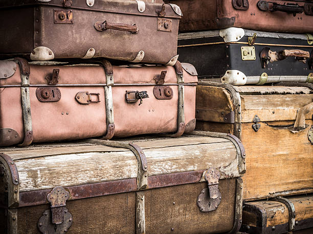istock Vintage leather suitcases stacked vertically - Spreewald, Germany. 564605068