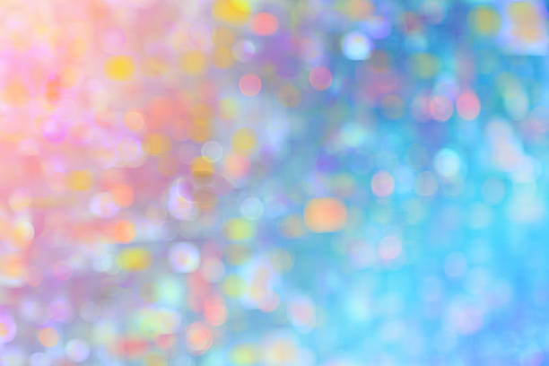 istock digitally generated image of blue and yellow bokeh 564605680