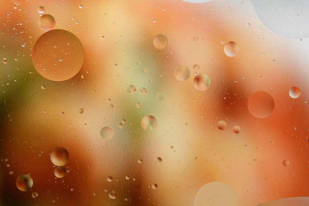 istock Oil drops in water. 564606216