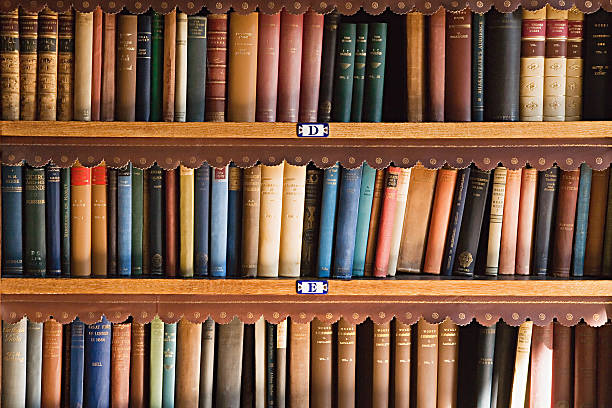 Bookcase  rows of books stock pictures, royalty-free photos & images