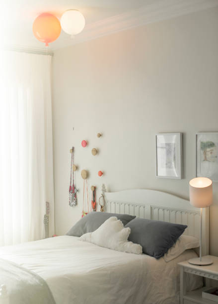 istock Balloon lights over childs bed 568518505