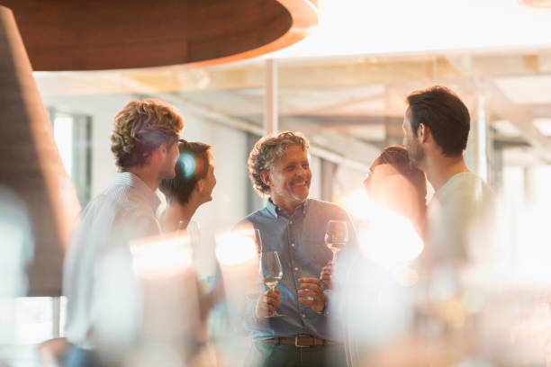 istock Friends wine tasting at winery 568518767