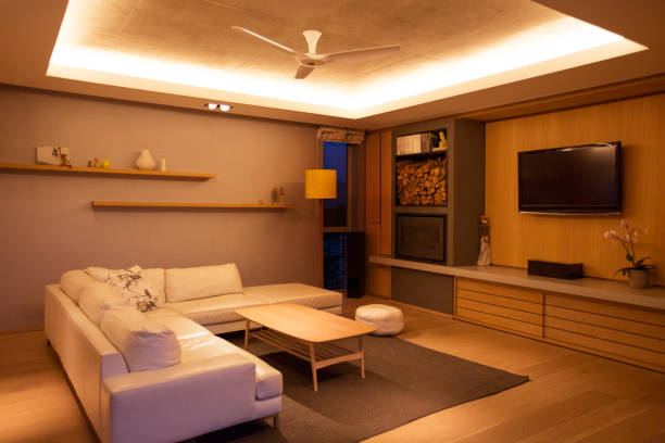 istock Illuminated tray ceiling over home showcase living room 568519063